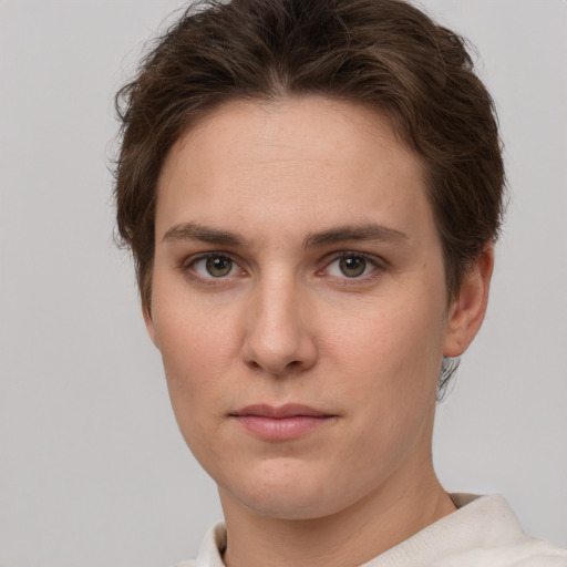 Neutral white young-adult female with short  brown hair and brown eyes