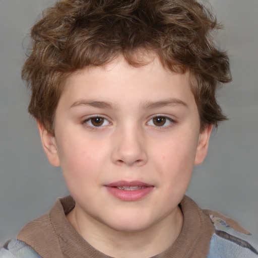 Joyful white child male with short  brown hair and brown eyes