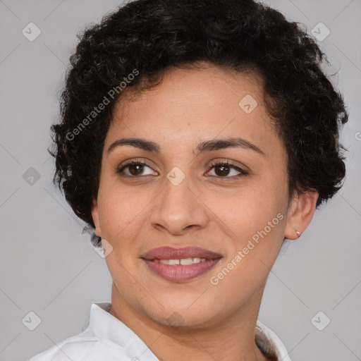 Joyful latino young-adult female with short  brown hair and brown eyes