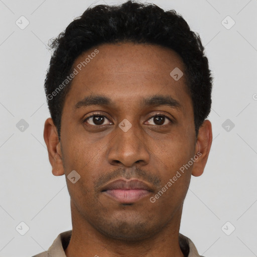 Neutral black young-adult male with short  black hair and brown eyes