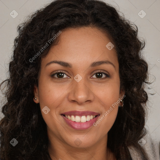 Joyful black young-adult female with long  brown hair and brown eyes