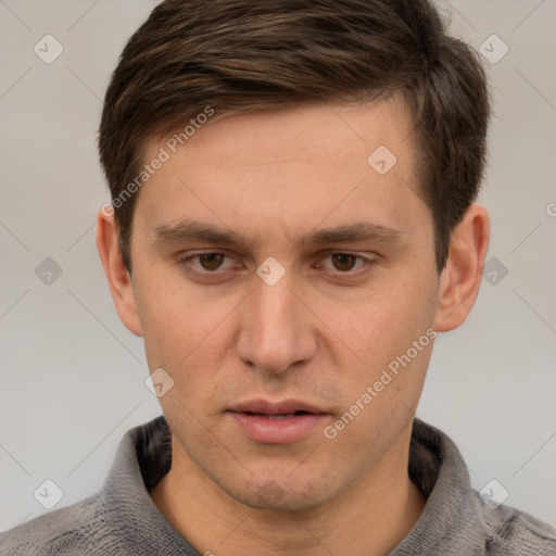 Neutral white young-adult male with short  brown hair and grey eyes