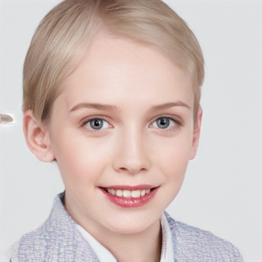 Joyful white child female with short  brown hair and blue eyes