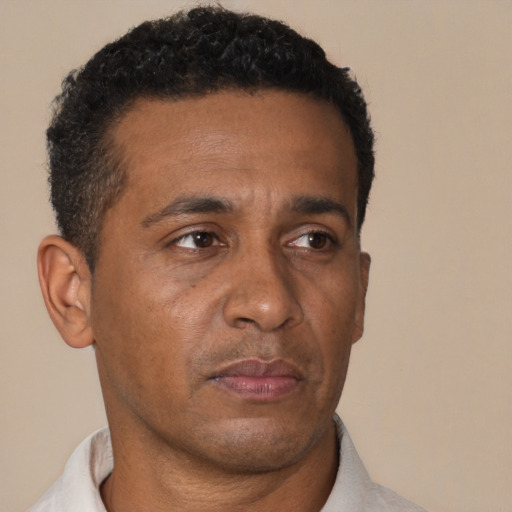 Neutral black adult male with short  brown hair and brown eyes
