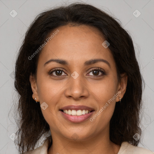 Joyful latino young-adult female with medium  brown hair and brown eyes