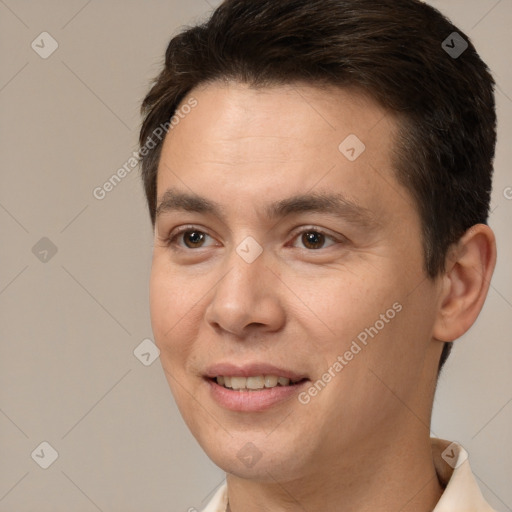 Joyful white adult male with short  brown hair and brown eyes