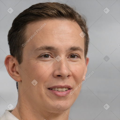 Joyful white adult male with short  brown hair and brown eyes