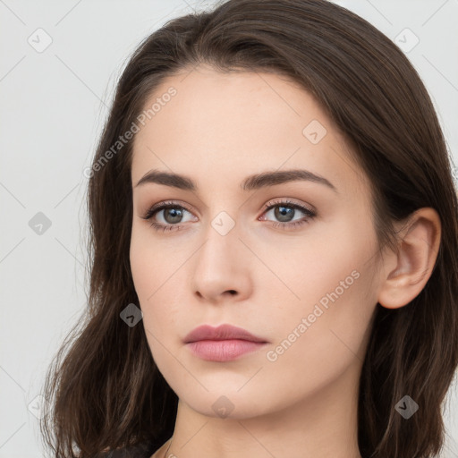 Neutral white young-adult female with long  brown hair and brown eyes