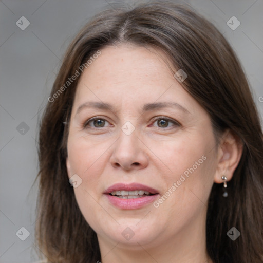 Joyful white adult female with medium  brown hair and grey eyes