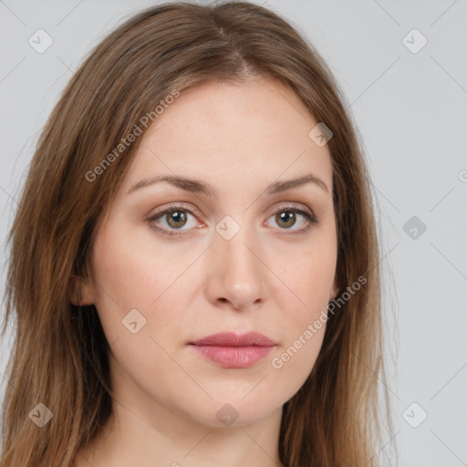 Joyful white young-adult female with long  brown hair and green eyes