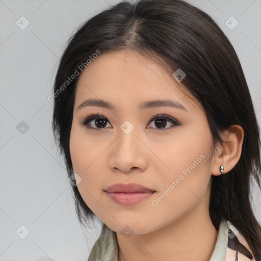 Joyful latino young-adult female with medium  brown hair and brown eyes