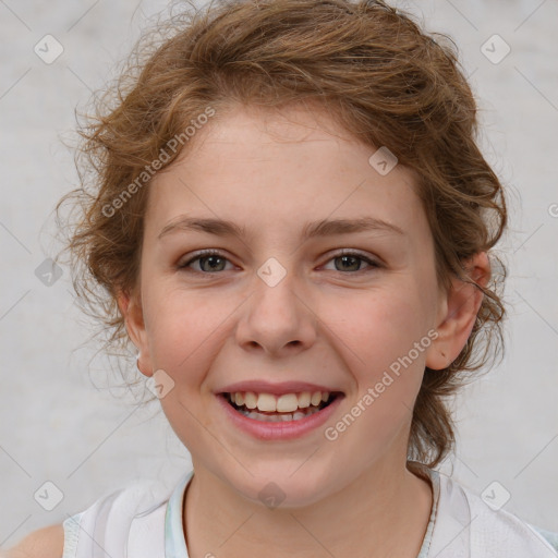 Joyful white child female with medium  brown hair and brown eyes