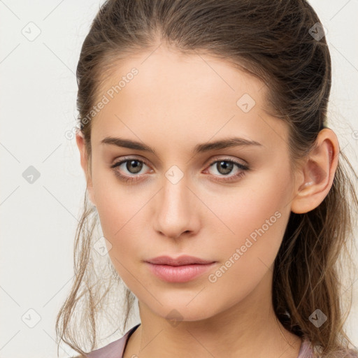 Neutral white young-adult female with long  brown hair and brown eyes