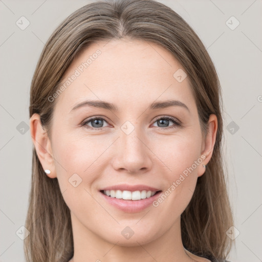 Joyful white young-adult female with long  brown hair and grey eyes