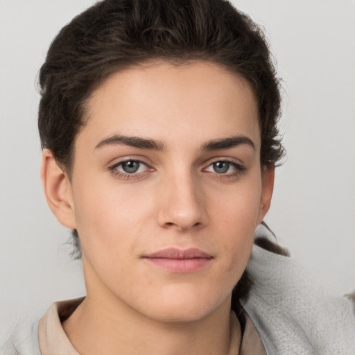 Neutral white young-adult female with short  brown hair and brown eyes