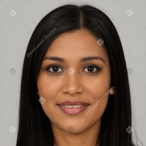 Joyful latino young-adult female with long  black hair and brown eyes