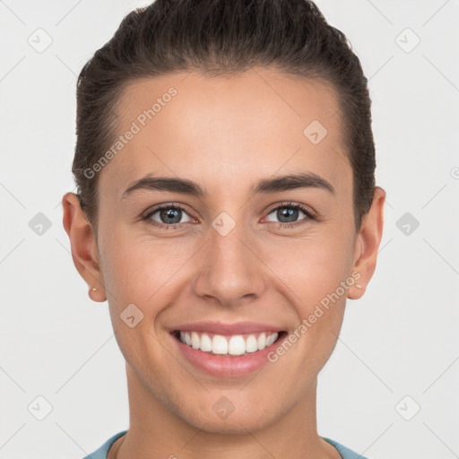 Joyful white young-adult female with short  brown hair and brown eyes