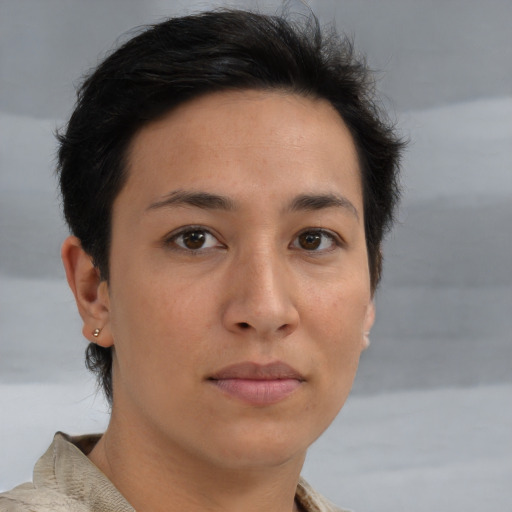 Joyful asian young-adult female with short  brown hair and brown eyes