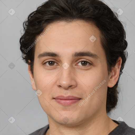 Joyful white young-adult male with medium  brown hair and brown eyes