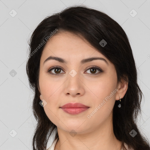 Joyful latino young-adult female with long  brown hair and brown eyes