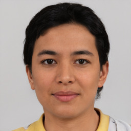 Joyful asian young-adult female with short  black hair and brown eyes