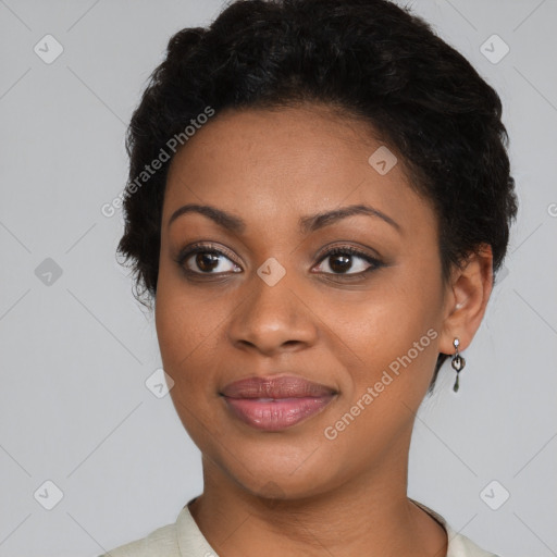 Joyful black young-adult female with short  brown hair and brown eyes