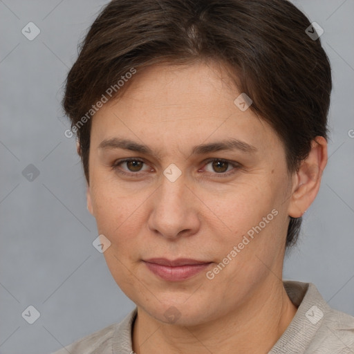 Joyful white adult female with short  brown hair and brown eyes