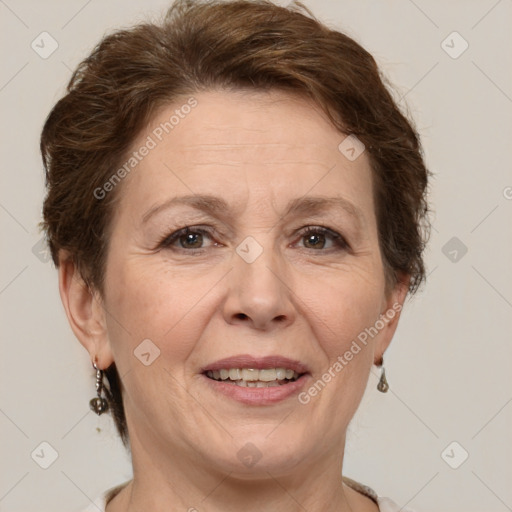 Joyful white adult female with short  brown hair and brown eyes