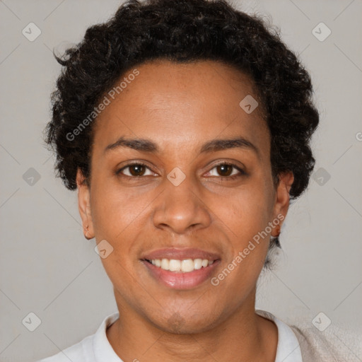 Joyful black young-adult female with short  brown hair and brown eyes