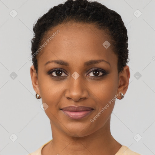 Joyful black young-adult female with short  brown hair and brown eyes