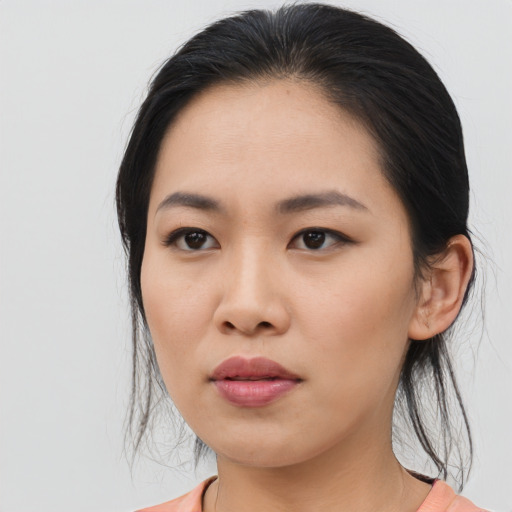 Neutral asian young-adult female with medium  black hair and brown eyes