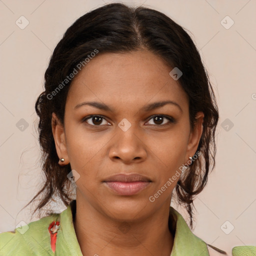 Joyful black young-adult female with medium  brown hair and brown eyes