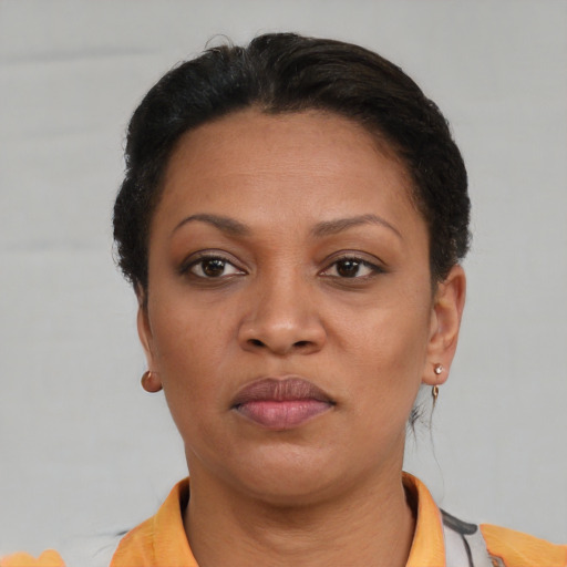Neutral black adult female with short  brown hair and brown eyes