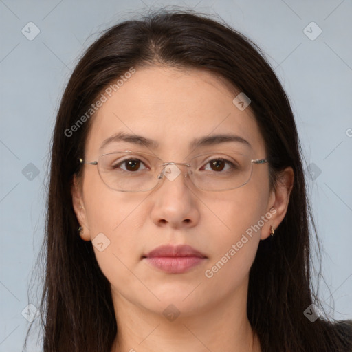 Neutral white young-adult female with long  brown hair and brown eyes