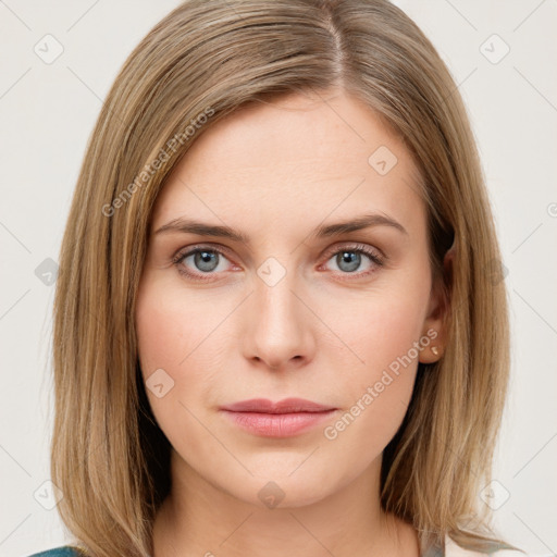 Neutral white young-adult female with medium  brown hair and green eyes