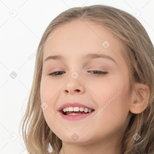 Joyful white child female with long  brown hair and brown eyes