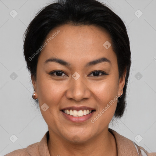 Joyful latino young-adult female with medium  brown hair and brown eyes