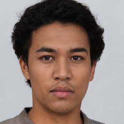 Neutral asian young-adult male with short  brown hair and brown eyes