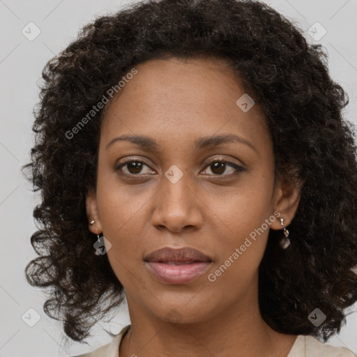 Neutral black young-adult female with medium  brown hair and brown eyes