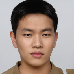 Neutral asian young-adult male with short  brown hair and brown eyes