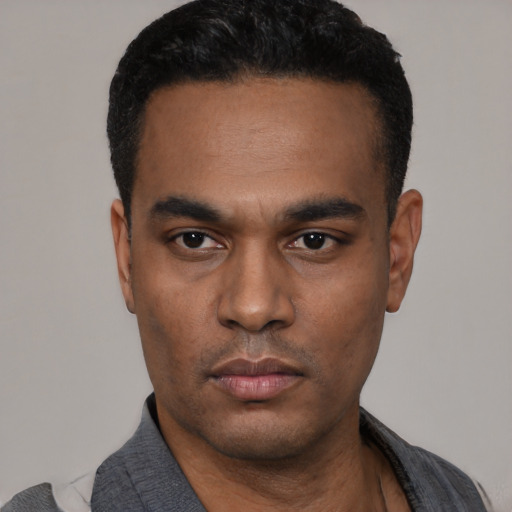 Neutral black young-adult male with short  black hair and brown eyes