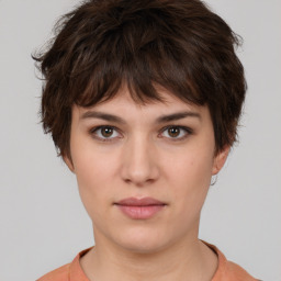 Neutral white young-adult female with short  brown hair and brown eyes