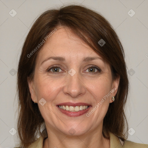 Joyful white adult female with medium  brown hair and brown eyes