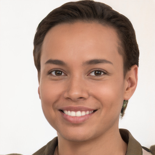 Joyful white young-adult female with short  brown hair and brown eyes