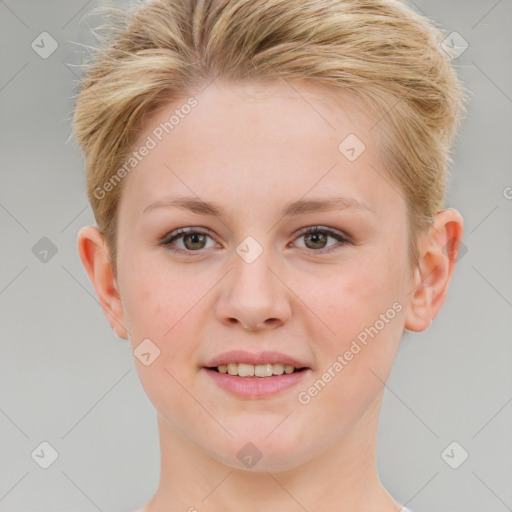 Joyful white young-adult female with short  brown hair and blue eyes