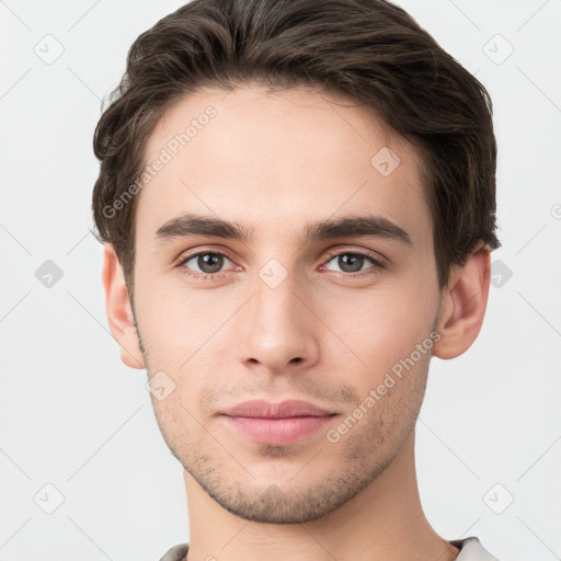 Neutral white young-adult male with short  brown hair and grey eyes