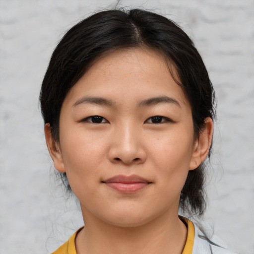Neutral asian young-adult female with medium  brown hair and brown eyes