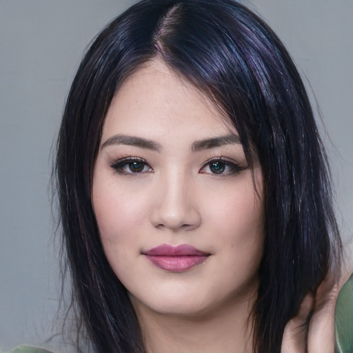 Joyful white young-adult female with medium  black hair and brown eyes
