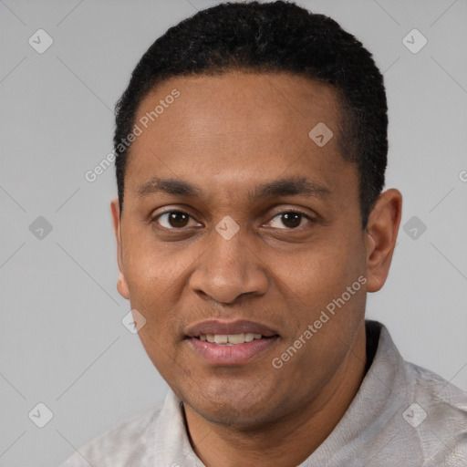 Joyful latino adult male with short  black hair and brown eyes