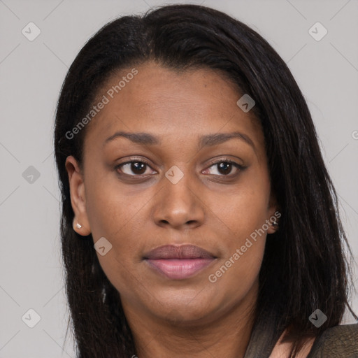 Joyful black young-adult female with long  brown hair and brown eyes